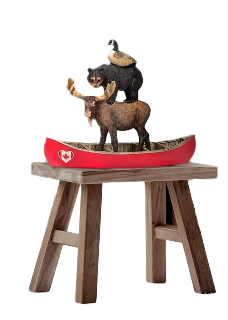 Stacked Animals in Canoe